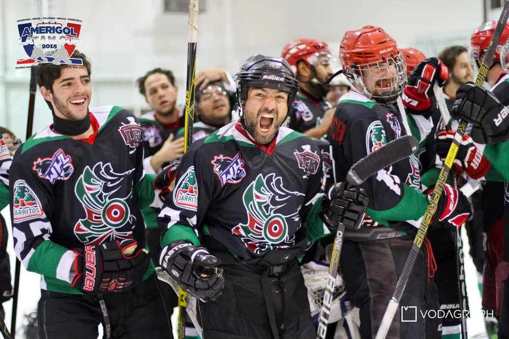 Diego and his teammates celebrating on the ice in Mexico jerseys at the 2018 Amerigol Latam Cup.